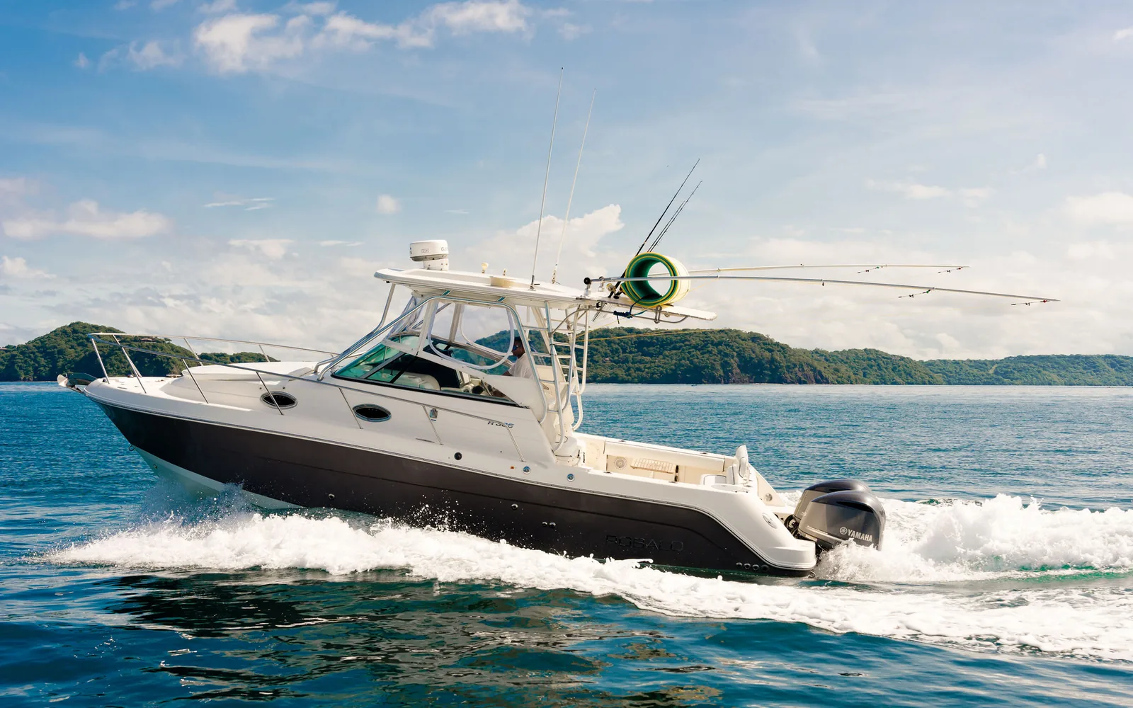 Pongui, an Ocean Club center console, anchored close to the shoreline on Costa Rica's Guanacaste coast