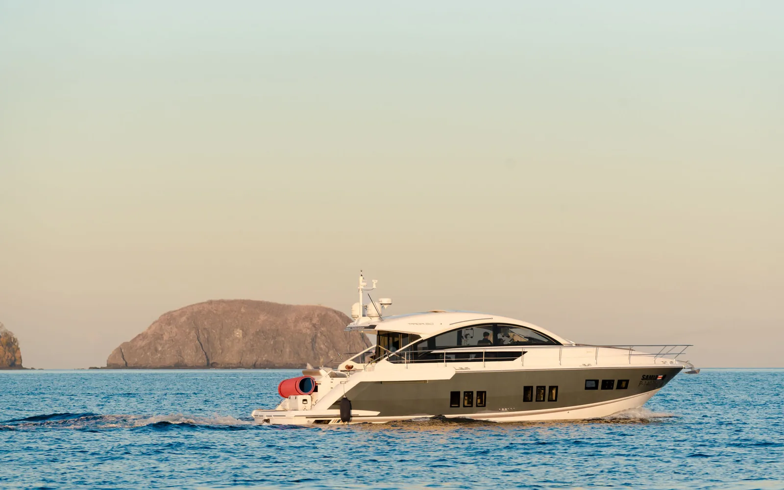 Samia, an Ocean Club motor yacht, running across open Ocean Club on Costa Rica's Pacific coast