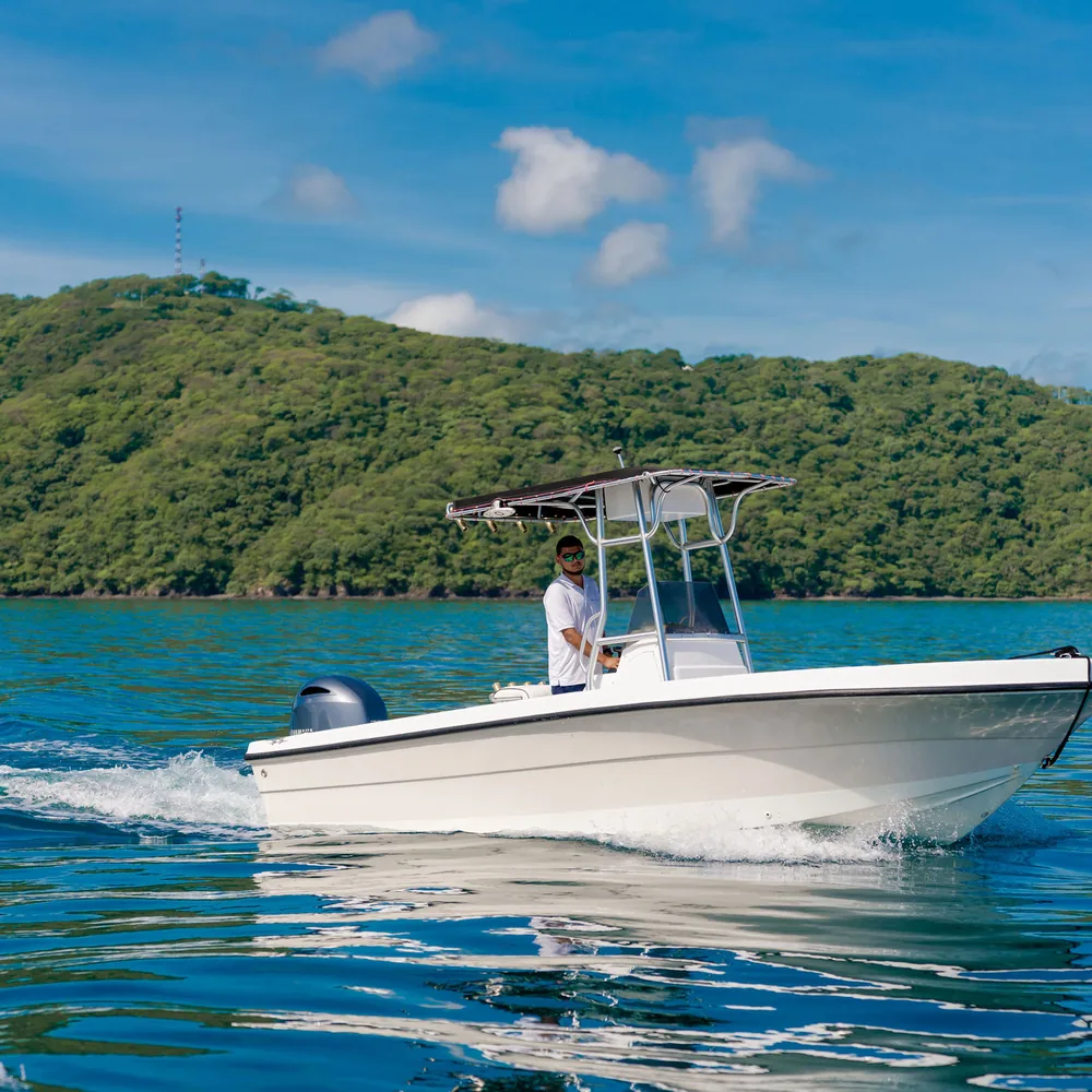 An Ocean Club center console fishing boat running across Ocean Club off Costa Rica