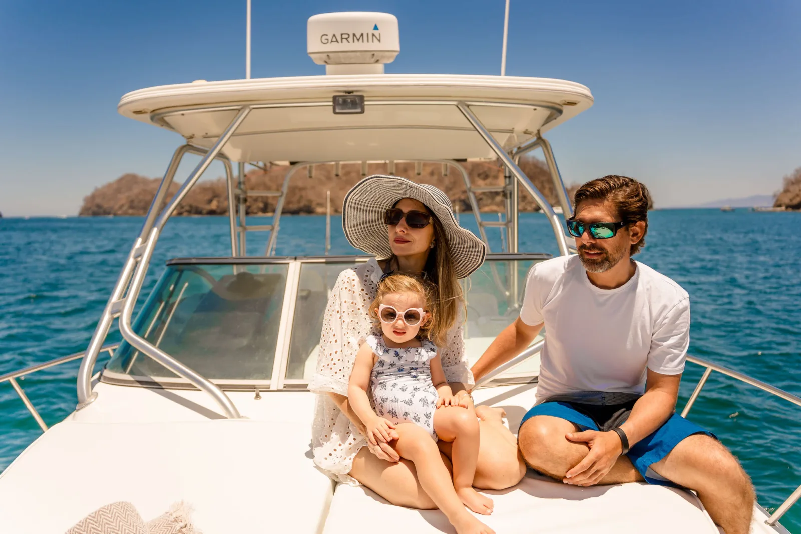 A family aboard Disparate off the Guanacaste coast