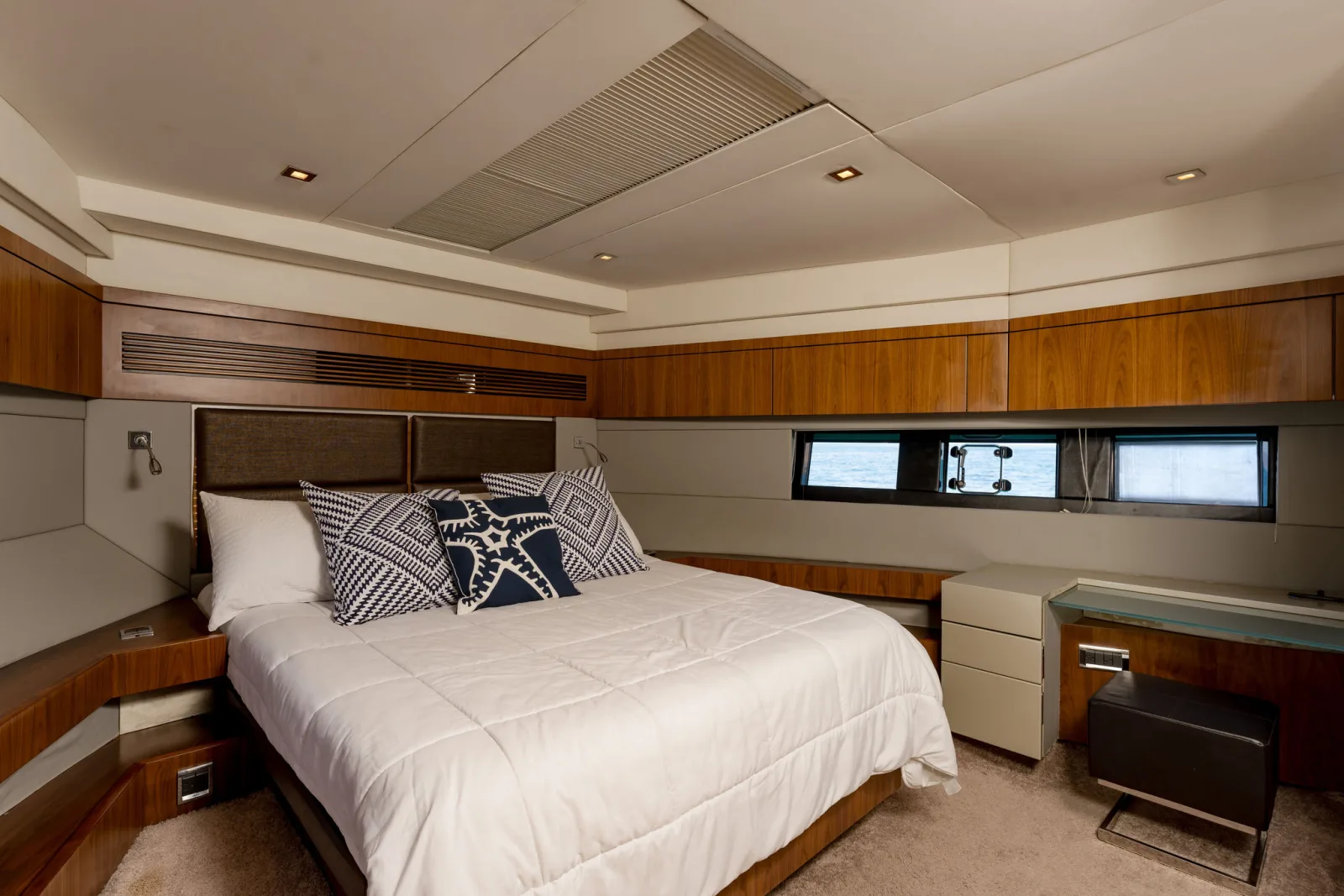 A guest cabin aboard Samia with a double berth