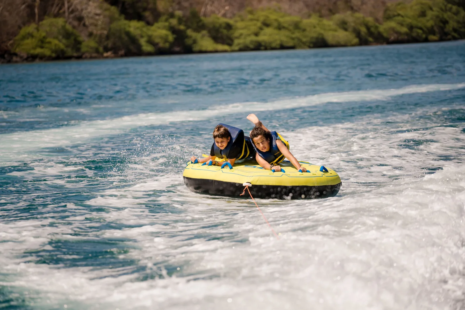 Riding the towable along the Guanacaste coastline