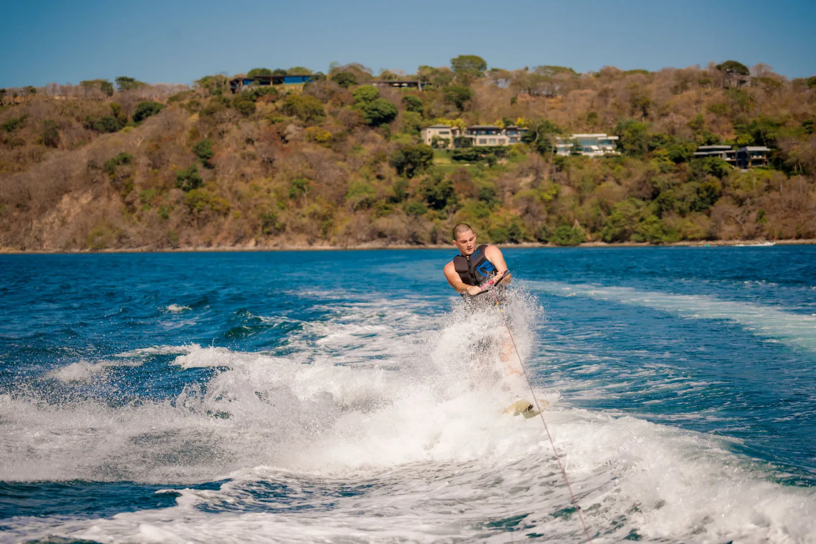 Wakeboarding behind the tender off Guanacaste
